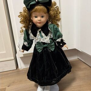 Elegant Green porcelain Doll with Bow